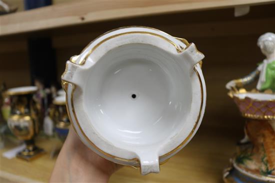 A pair of Paris porcelain figural bowls and a rolling pin